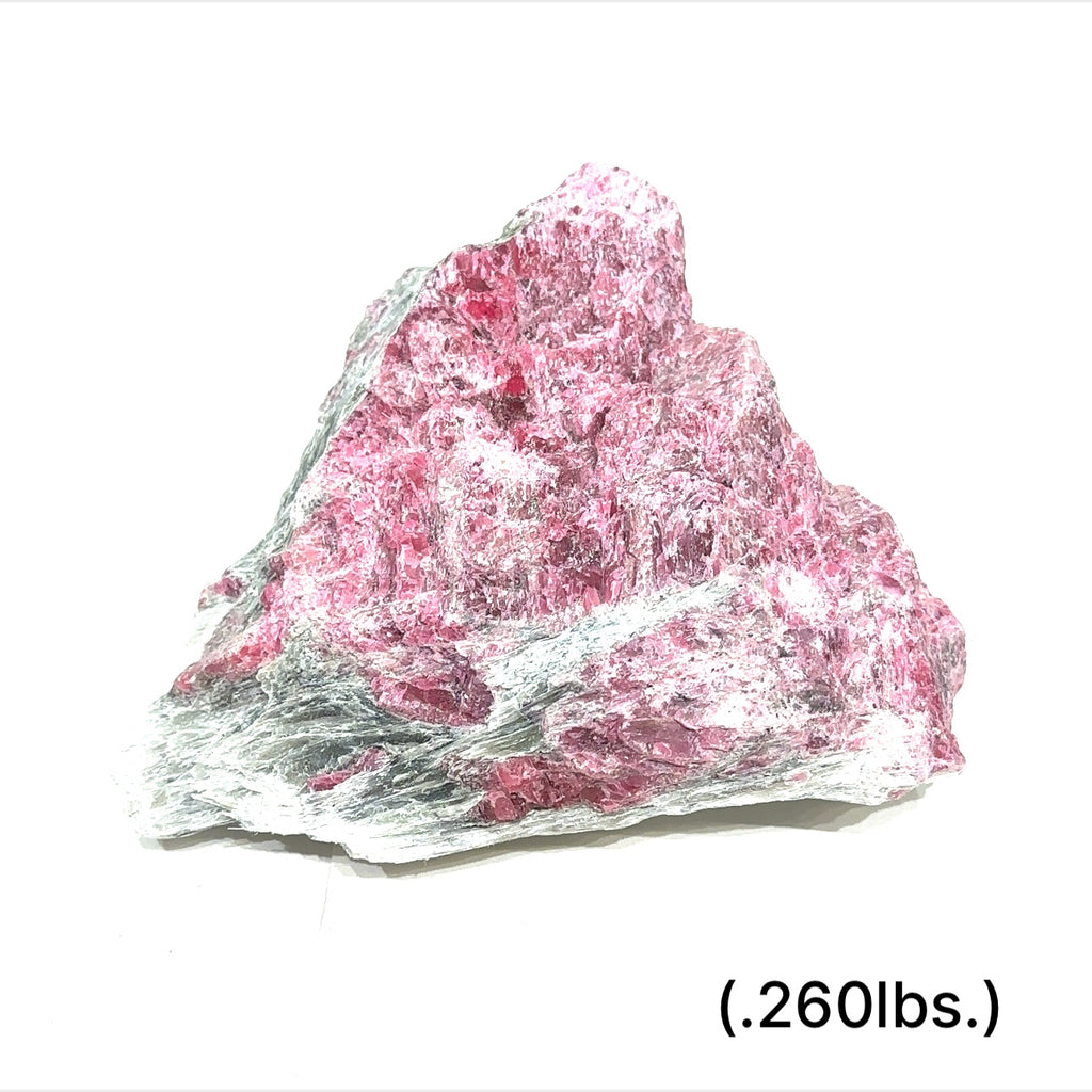 Raw Rhodonite gemstone in pink and black tones on white background size (.260lbs.) front view