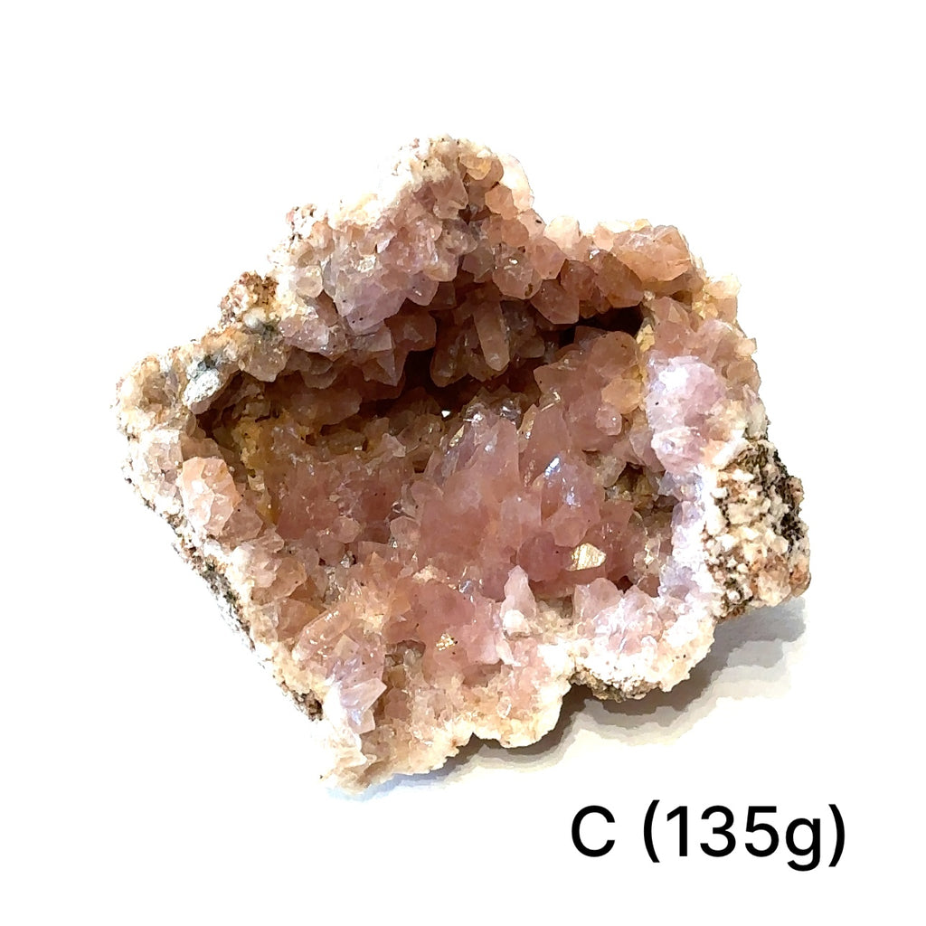 Raw pink amethyst cluster showing natural crystal points and soft pink hues on white #C (135g)  front view