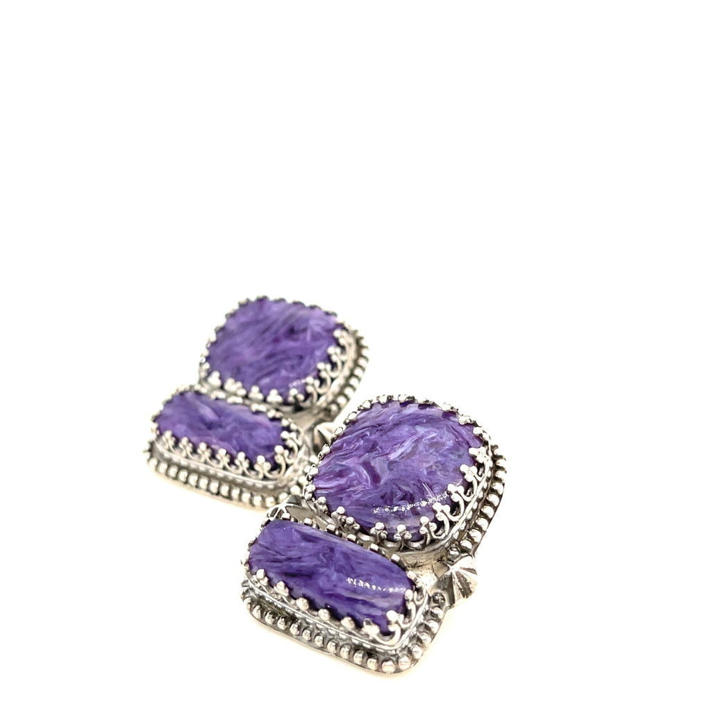 Rectangle Charoite double stone sterling silver earrings with swirling purple patterns studs an up-close front slight left angle view on a white background.