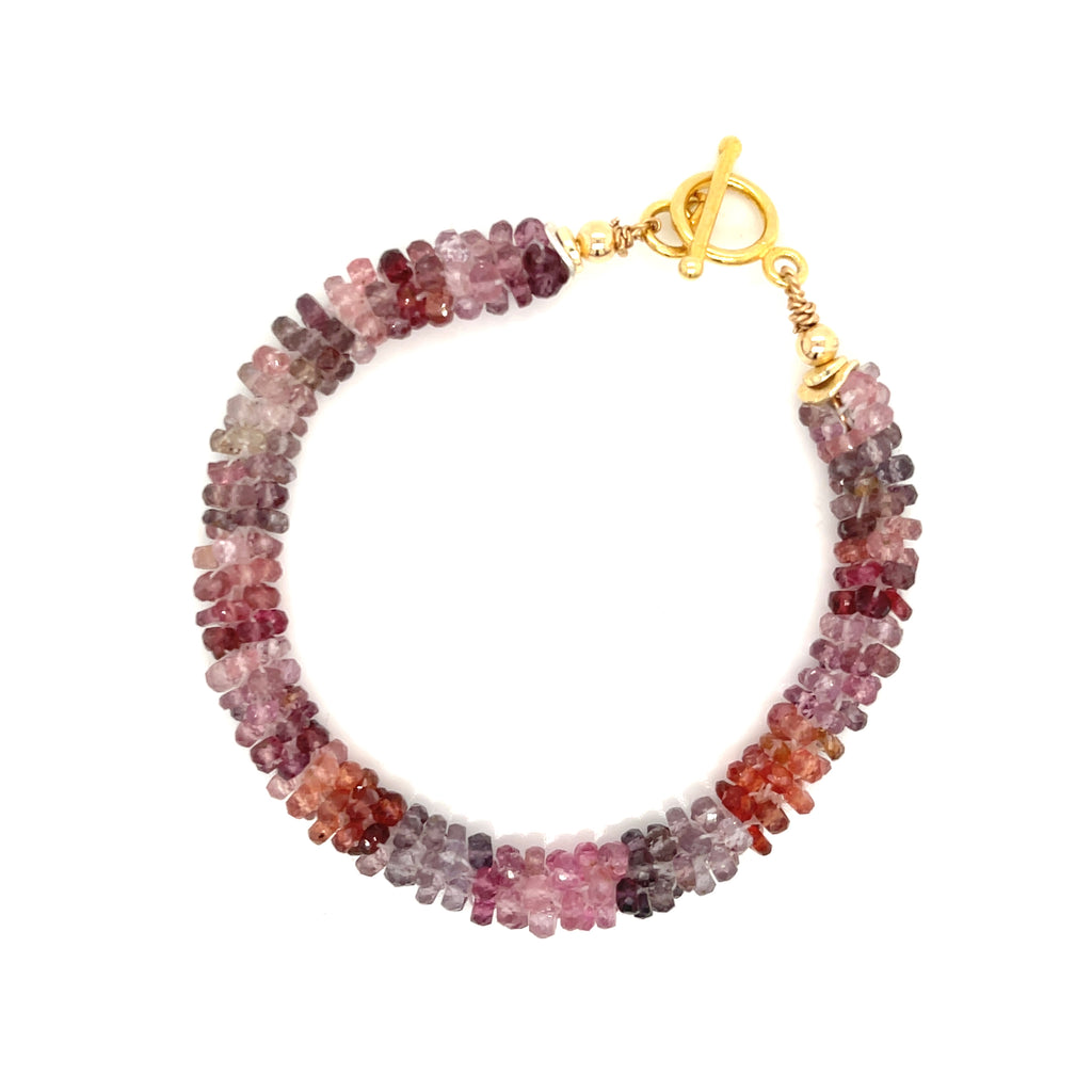 Red Spinel gemstone bracelet with gold-filled toggle — handcrafted by Hidden Jewel Boston on a white background center overview.