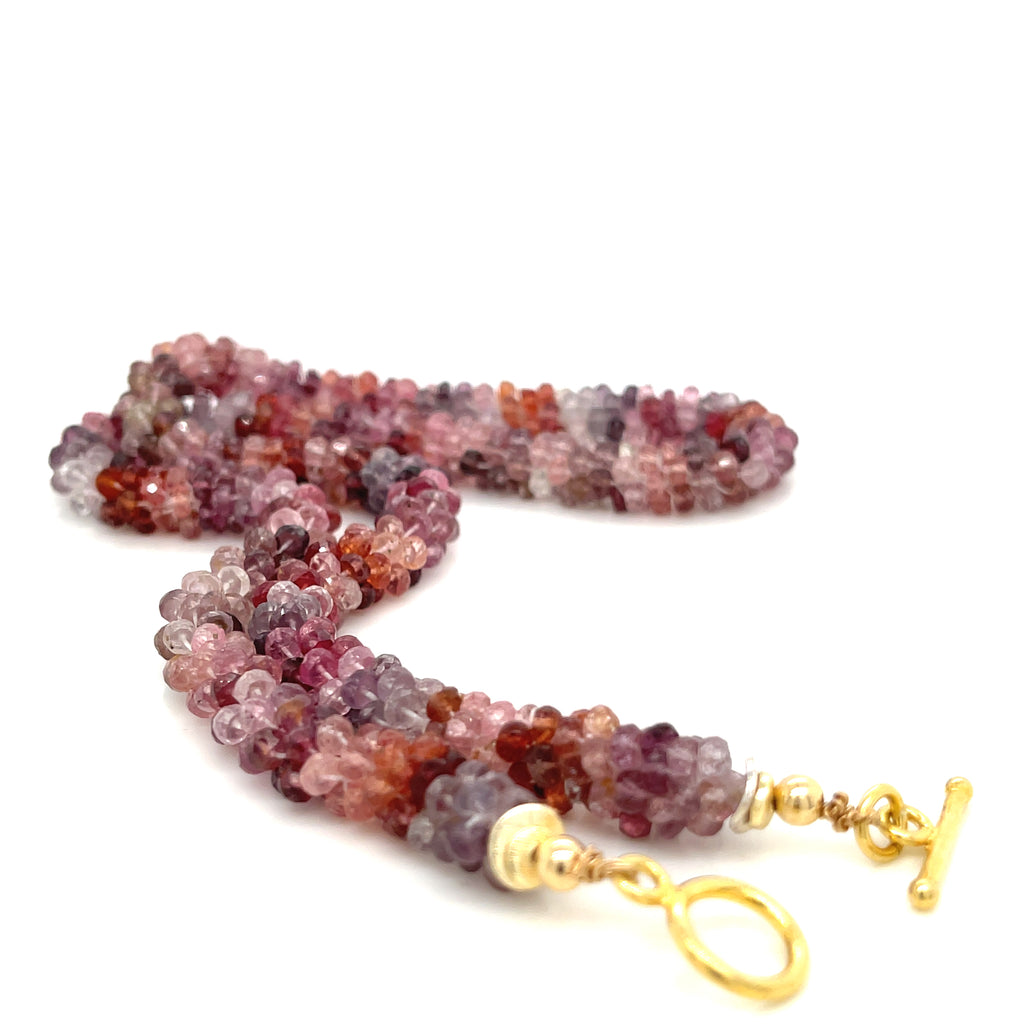 Red Spinel gemstone close-up — heart chakra and creativity healing stone on a white background long center toggle overview.