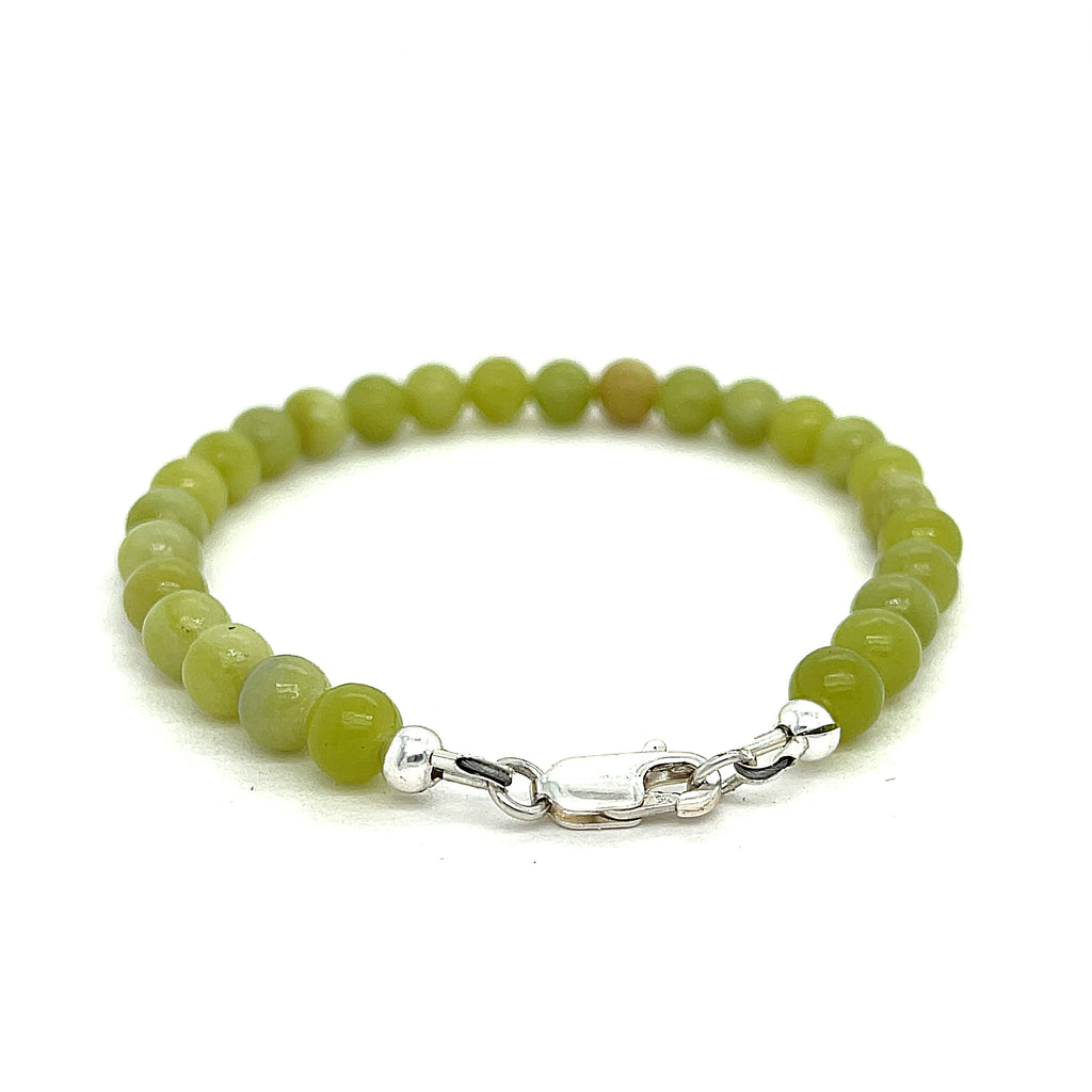 Serpentine gemstone bracelet with 6mm smooth green beads and Sterling Silver clasp from Hidden Jewel of the South End on a white background back overview. 
