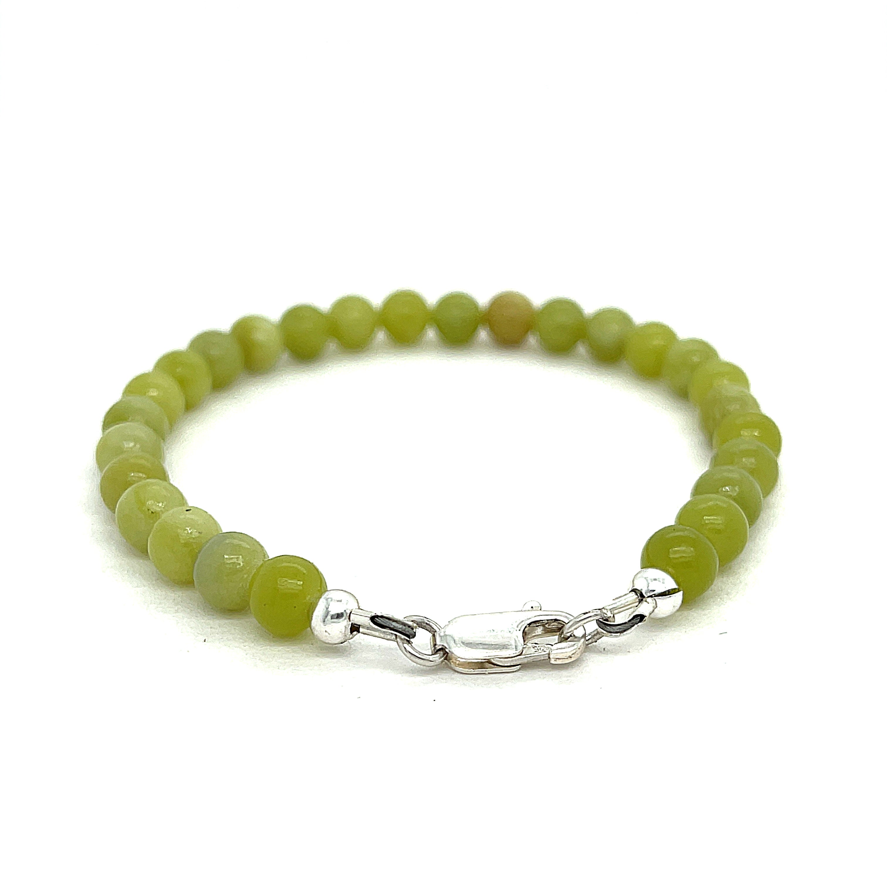Serpentine gemstone bracelet with 6mm smooth green beads and Sterling Silver clasp from Hidden Jewel of the South End on a white background back overview. 