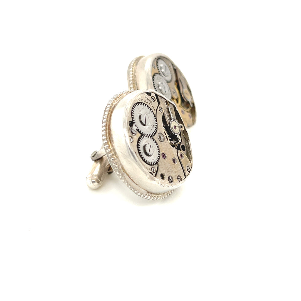 Sterling silver cuff links with mechanical detail handcrafted  in Boston on a white background  a  right side overview.