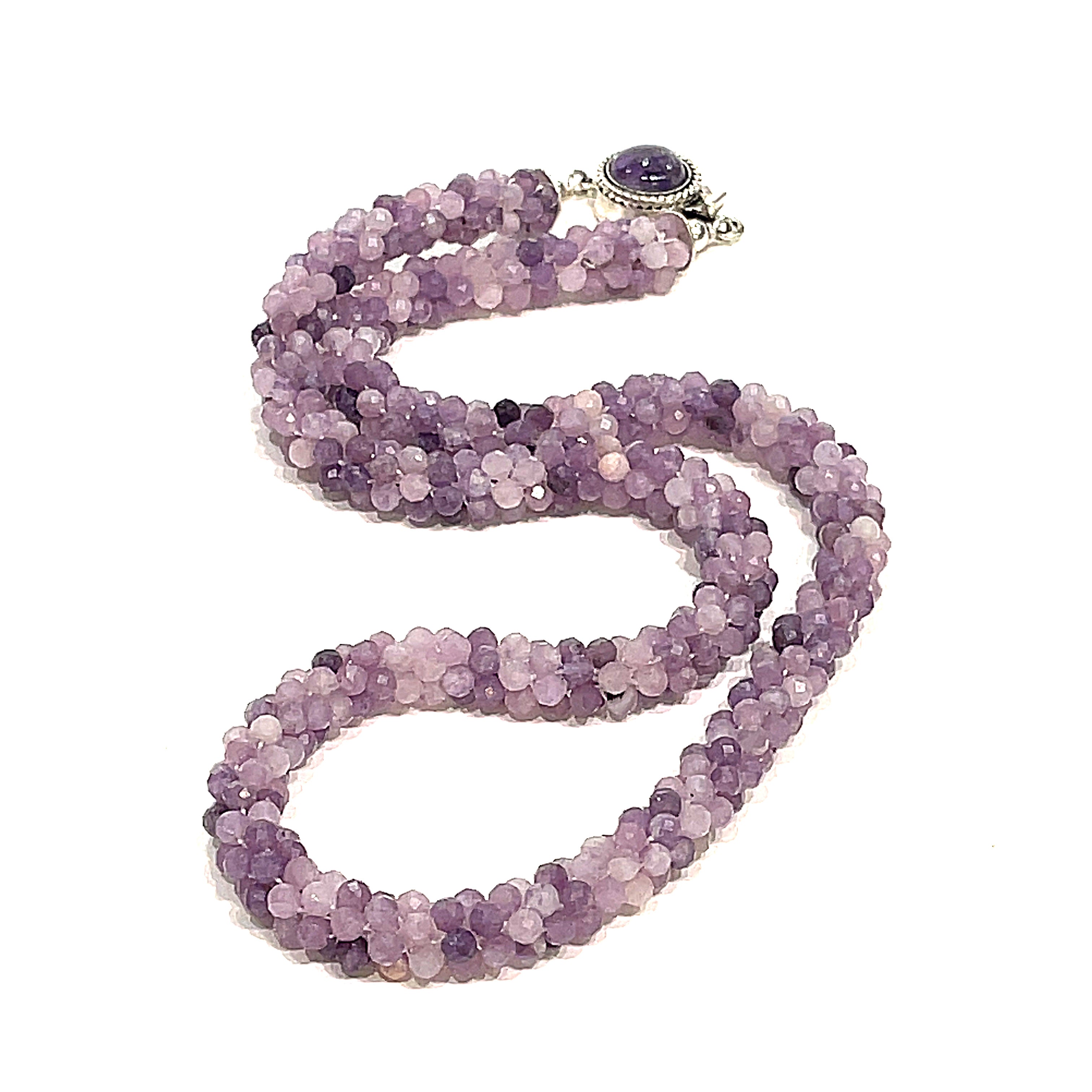 Sugilite crocheted gemstone necklace on a white background, long , front, close-up overview. 