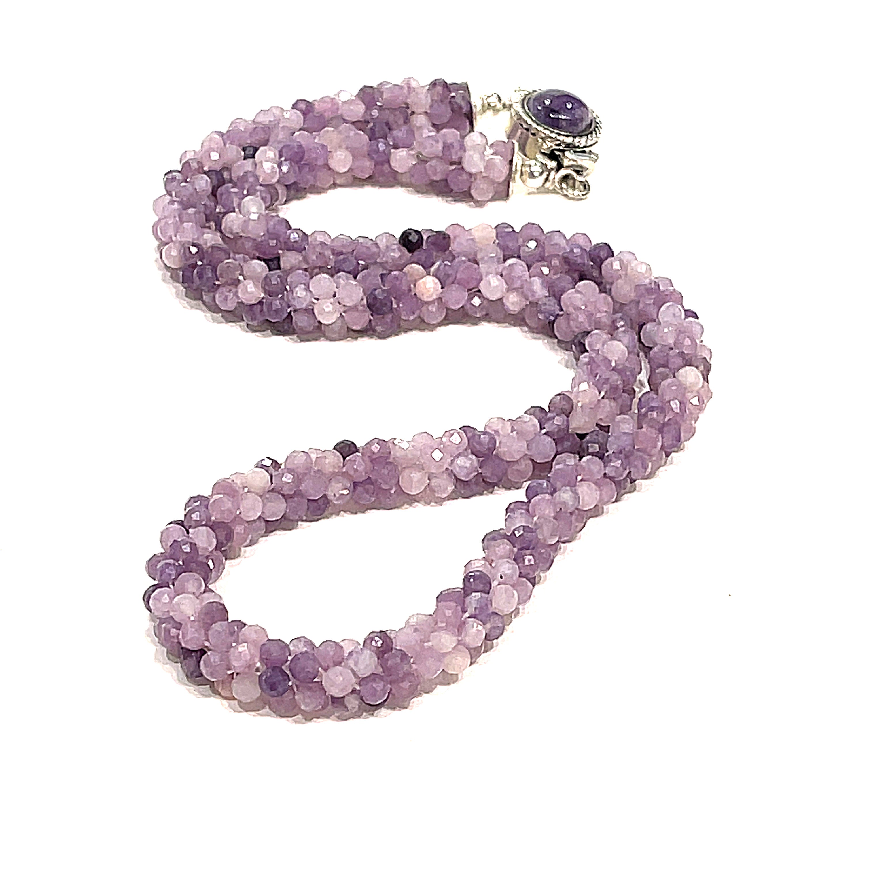 Sugilite crocheted gemstone necklace on a white background, long layout, front, overview. 