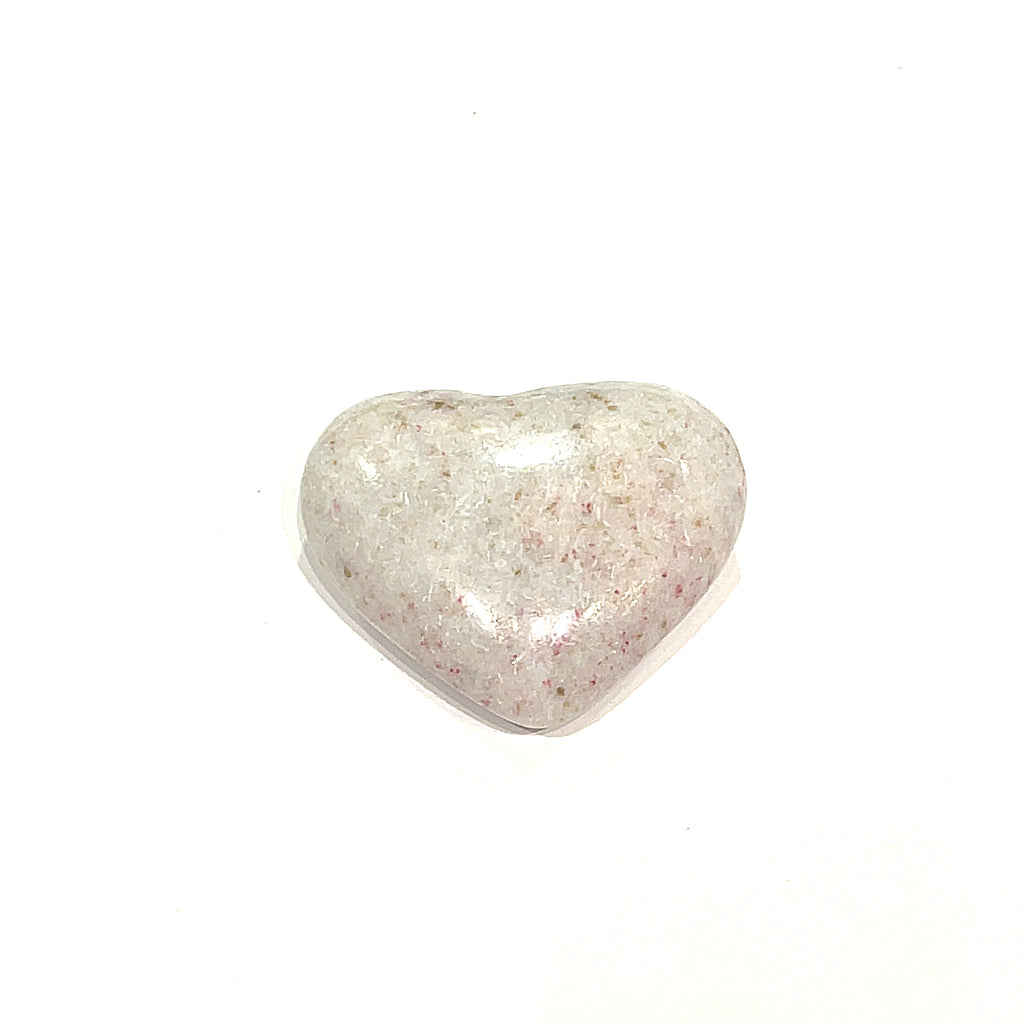 The smallest Cinnabar gemstone heart displayed on a white background front, center, overview. 
