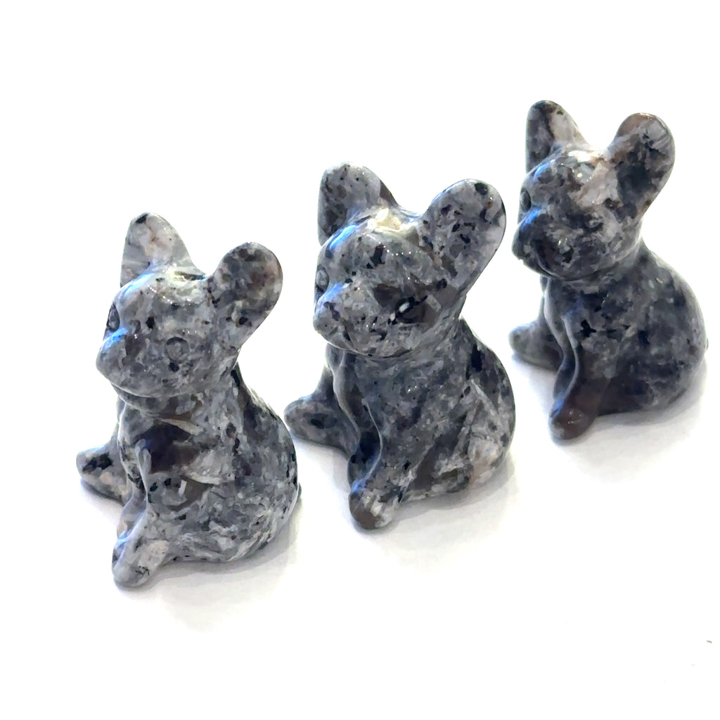 Three Moss Agate Bull Dogs gemstone carving on white background, front view. 