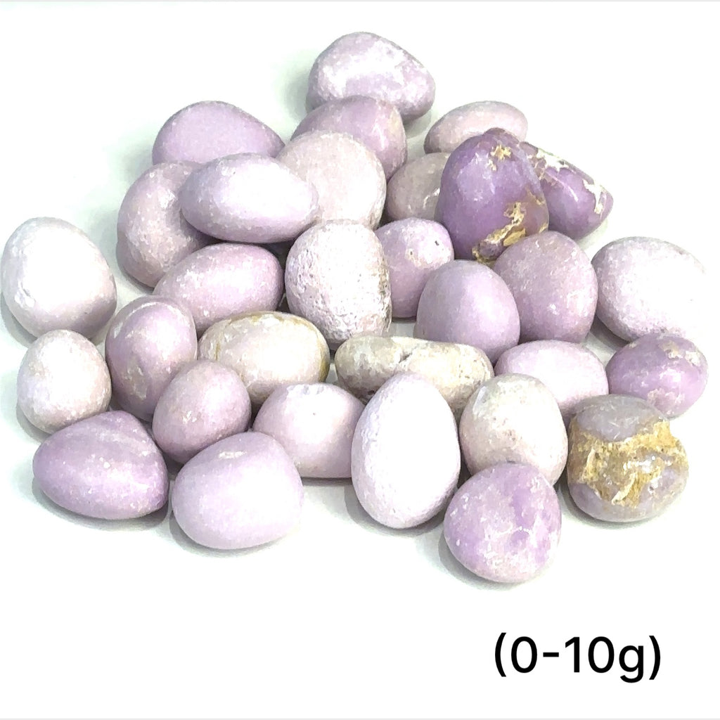 Tumbled Phosphosiderite gemstone in lavender tones on white background sizes (0-10g) overview