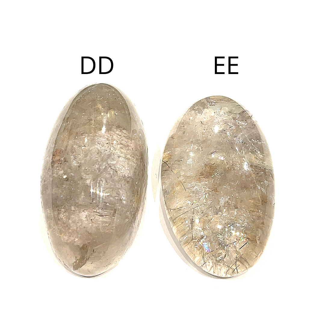 Two Brazilian Lodolite Garden Quartz palm gemstones, labeled DD and EE, are displayed on a white background in a front view. 