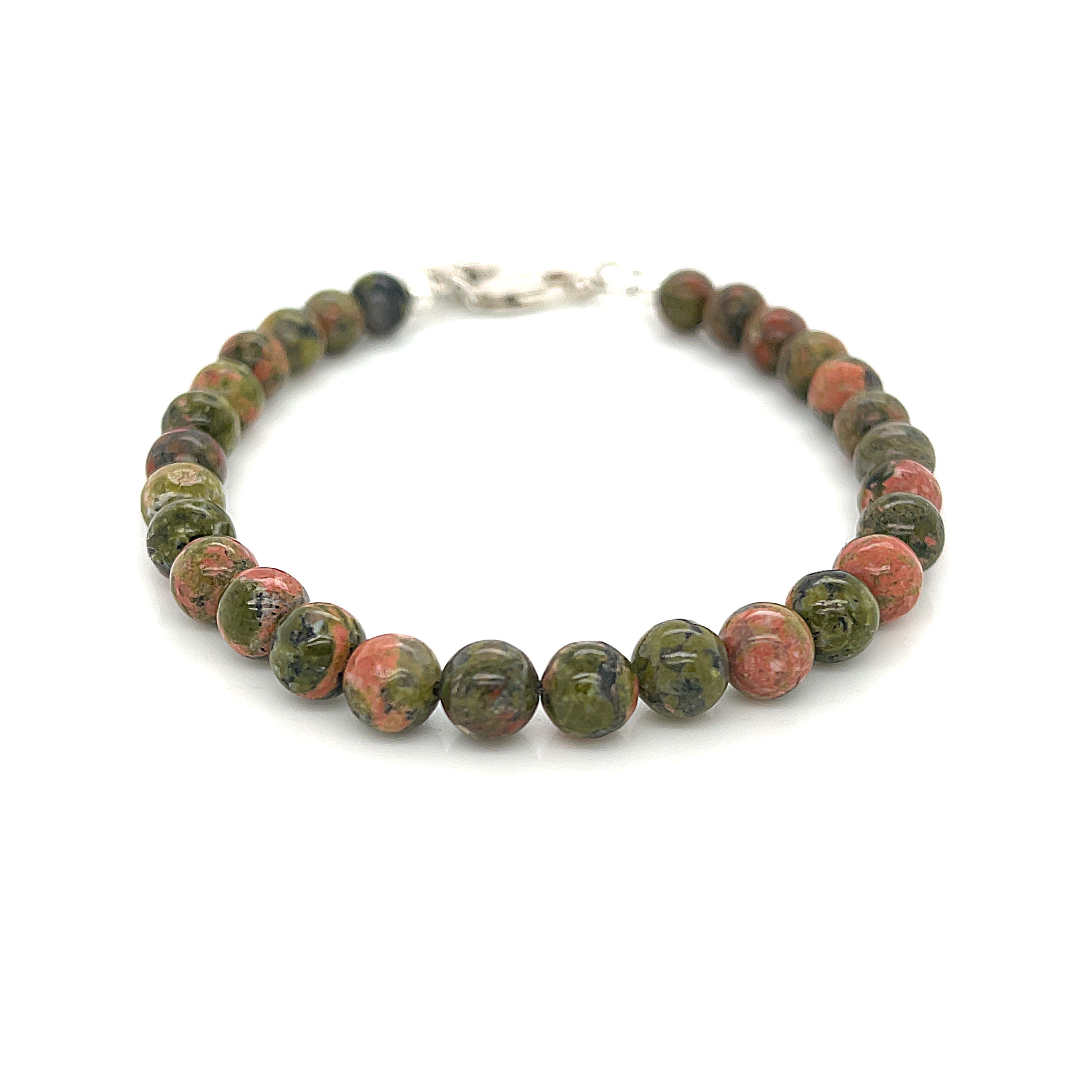 Unakite beaded bracelet with 6mm smooth round gemstones and a sterling silver lobster-claw clasp for gentle emotional healing, on a white background, front view. 
