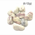 A collection of pink tourmaline in feldspar gemstones with a milky white color and scattered pink inclusions on a white background size (6-12g)