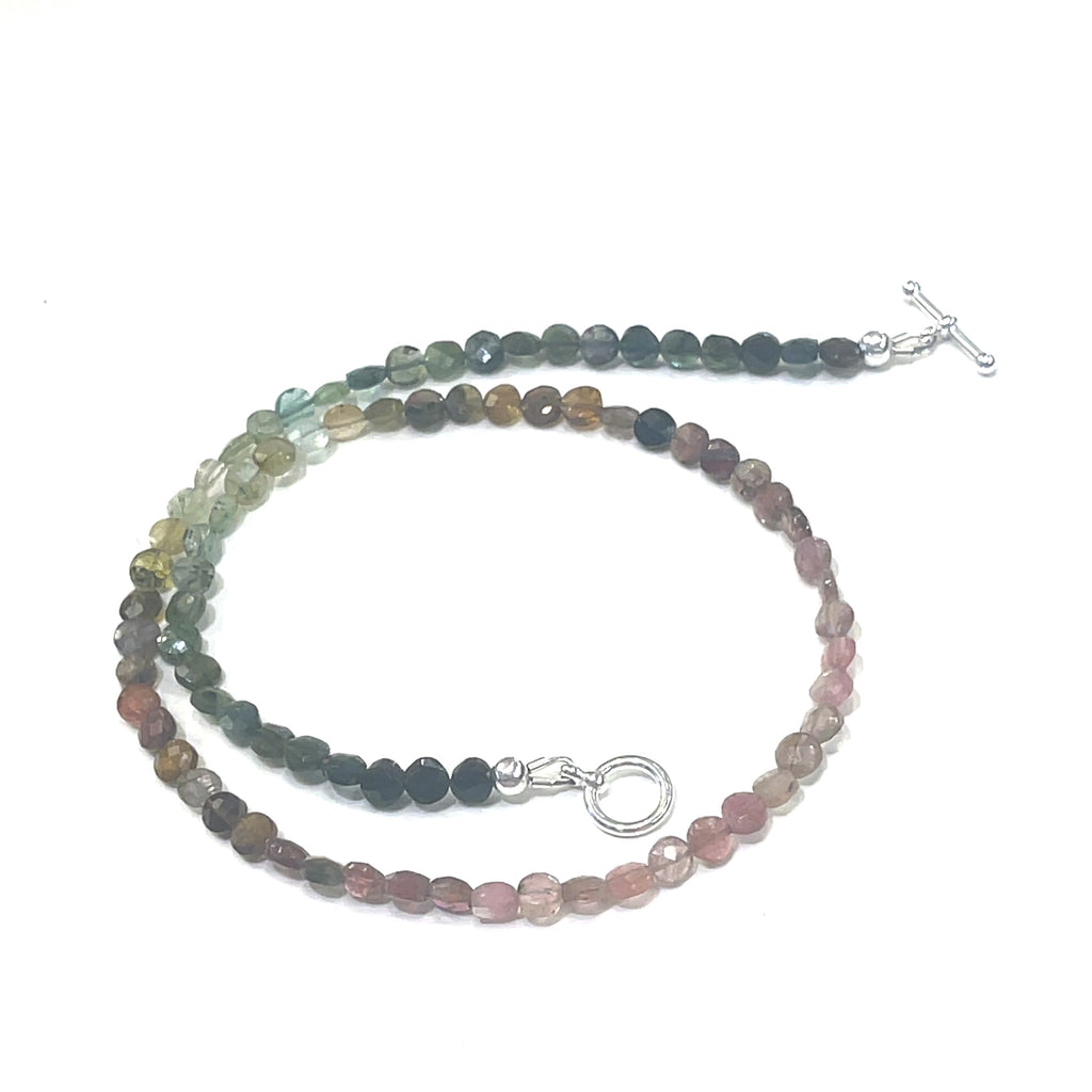 gemstone necklace with sterling silver accents by Hidden Jewel on a white background center spiral overview