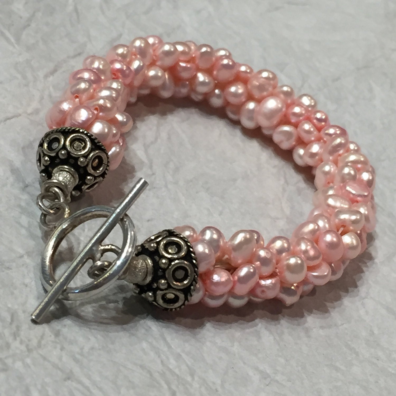 Peach Fresh-water Pearl crocheted bracelet, pink bangle