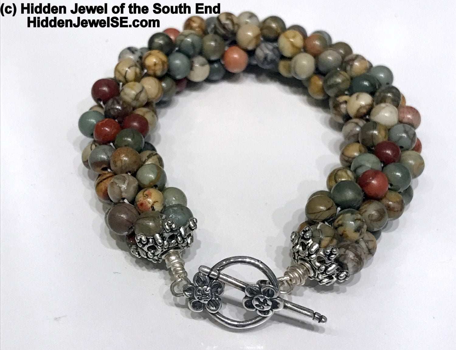 Picasso Jasper crocheted bracelet shows Brown, Red, and Green colors
