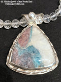 Parabia Tourmaline pendant necklace featuring white topaz and sterling setting