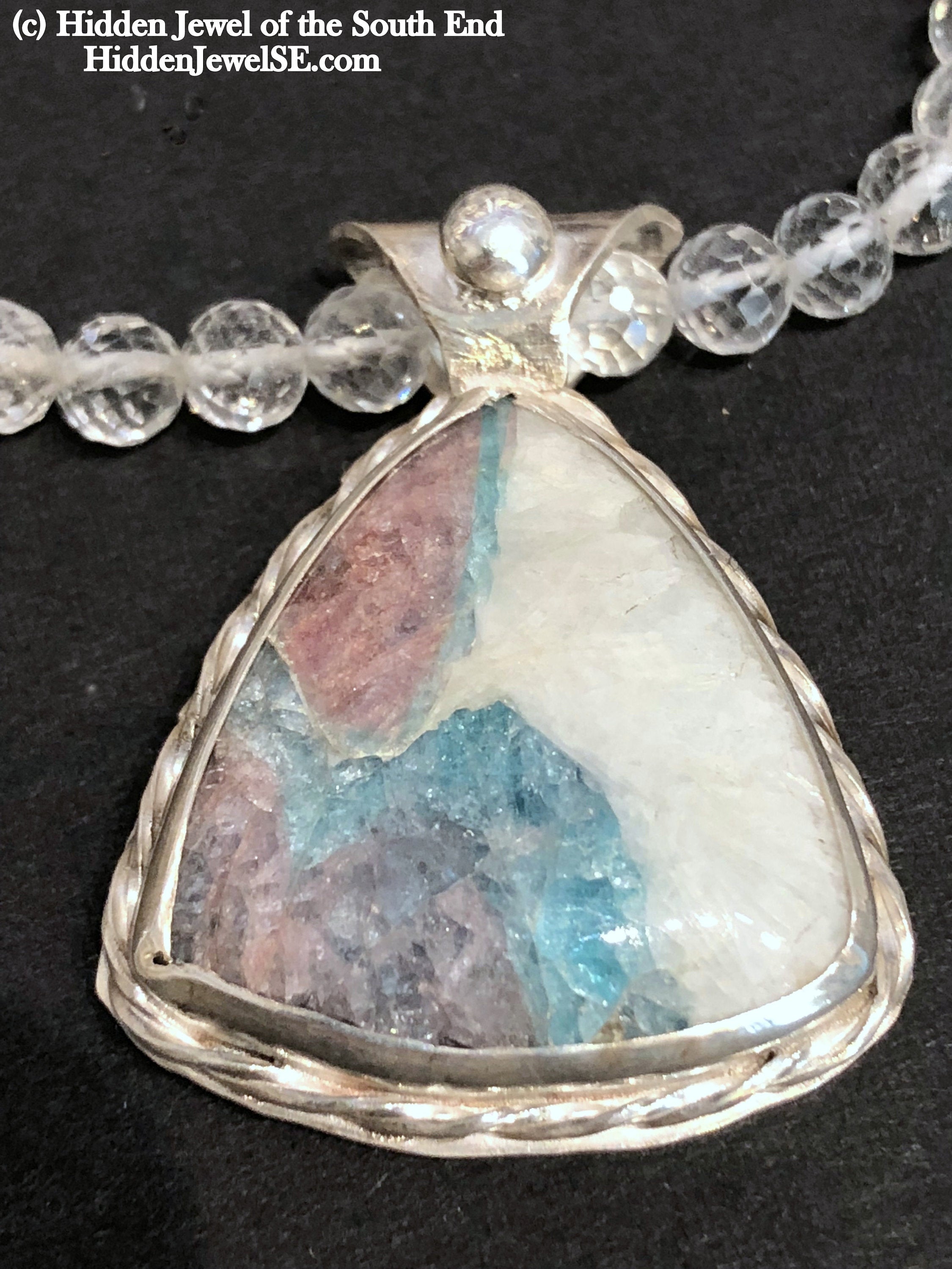 Parabia Tourmaline pendant necklace featuring white topaz and sterling setting